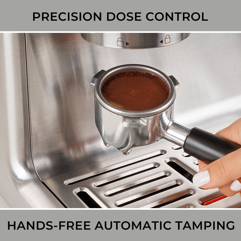 Closeup image of a hand holding the portafilter, containing an evenly tamped puck of finely ground coffee, below the grinder/tamper outlet. Text above reads, "Precision dose control," and text below reads, "Hands-free automatic tamping."